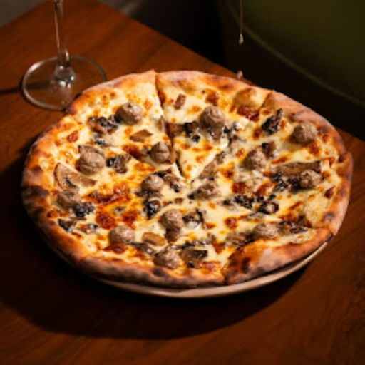 Mushroom & Truffle Pizza topped with sautéed mushrooms and truffle oil at Tattva Bar and Café